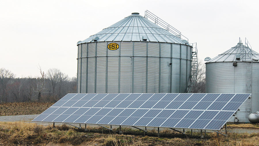 Solar panels provide electricity to grain bins